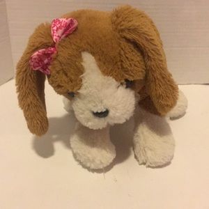 Brown and white Barbie dog